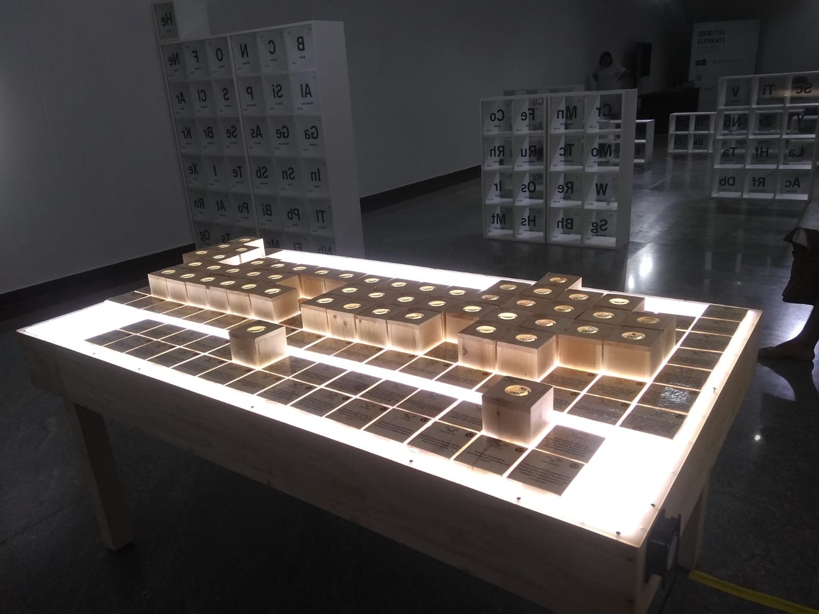 A lightbox table laid out like the periodic table