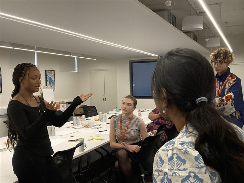 Participants discussing around the table