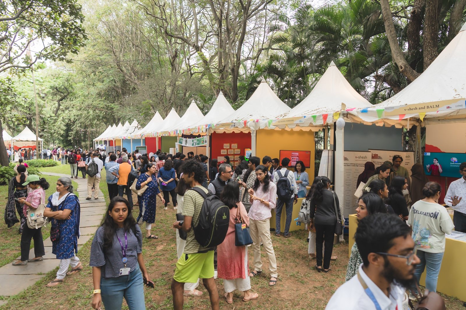 Crowds among the stalls at Manotsava